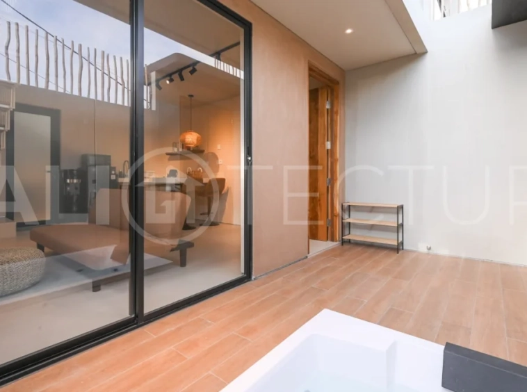 Brand-new 2-bedroom villa for sale in Pecatu, Uluwatu, featuring a modern two-storey design, 55 m² of land, 70 m² of building space, and a private jacuzzi, close to beaches, restaurants, cafés, gyms, golf, and renowned beach clubs.