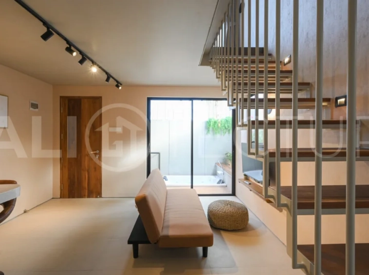 Brand-new 2-bedroom villa for sale in Pecatu, Uluwatu, featuring a modern two-storey design, 55 m² of land, 70 m² of building space, and a private jacuzzi, close to beaches, restaurants, cafés, gyms, golf, and renowned beach clubs.