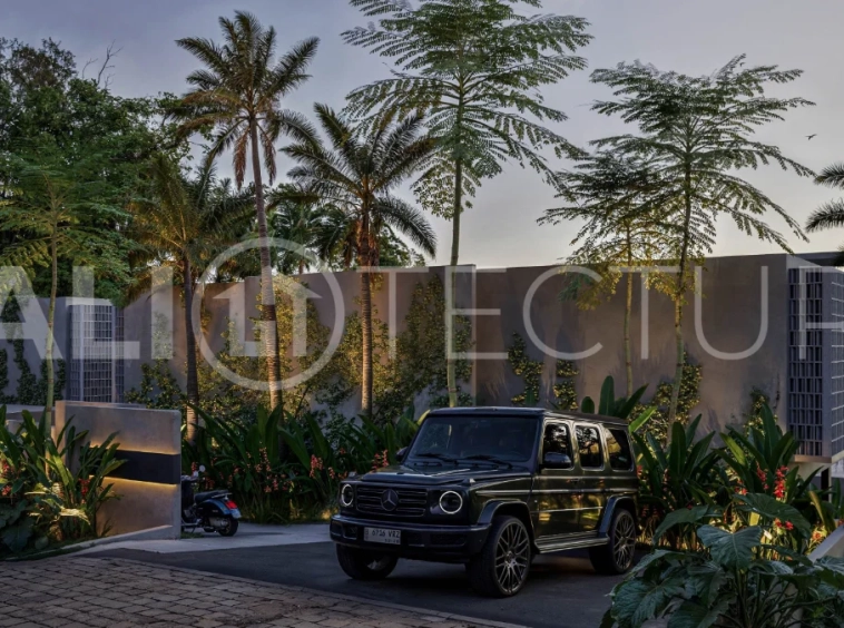 Exotic one bedroom tropical villa near Savaya Uluwatu, set within a lush jungle hillside, featuring a private pool, natural stone and timber finishes, contemporary architecture, and light filled interiors.