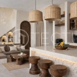 Mediterranean style three bedroom villa in Balangan, featuring a private pool and jacuzzi, spacious rooftop with pergola, outdoor lounge and barbecue area, and elegant tropical surroundings.