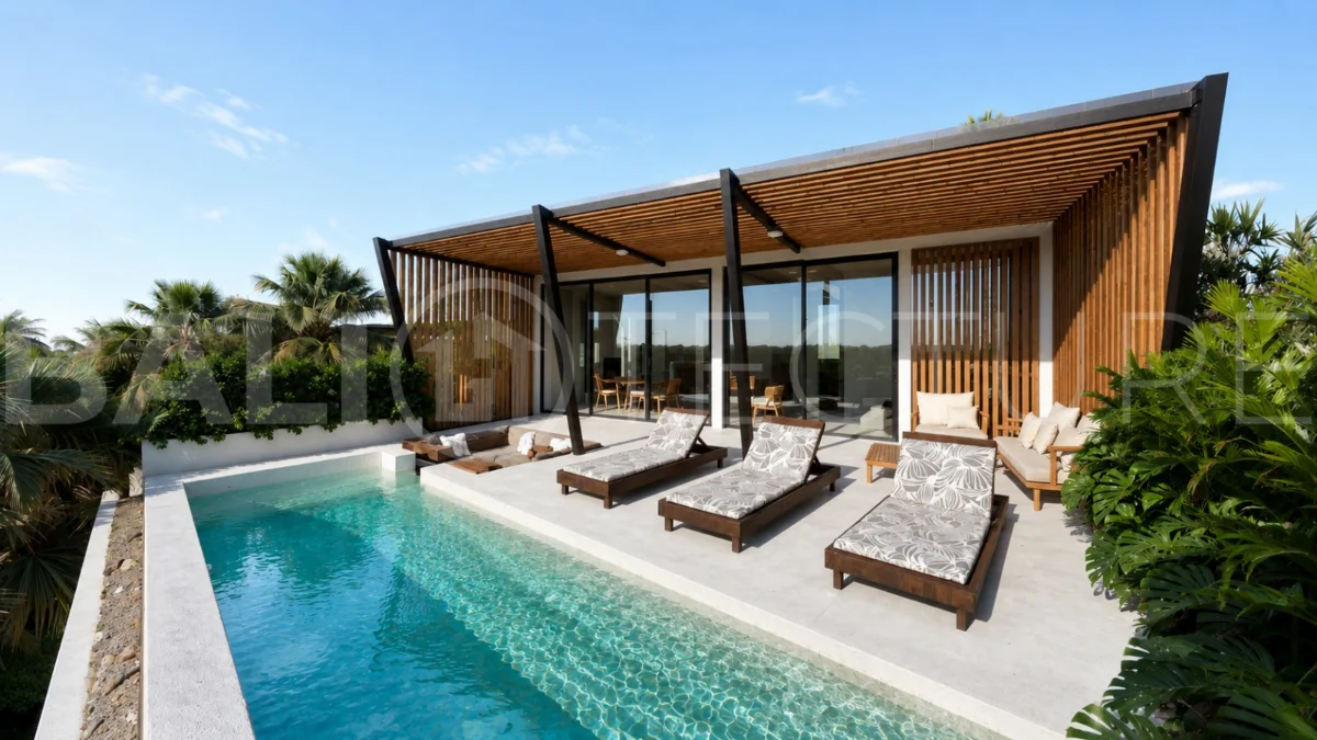 Modern tropical 2-bedroom villa development for sale in Cepaka, Kaba Kaba, Bali, featuring lush tropical landscaping, natural stone and wood finishes, private villa options, and a shared infinity pool.