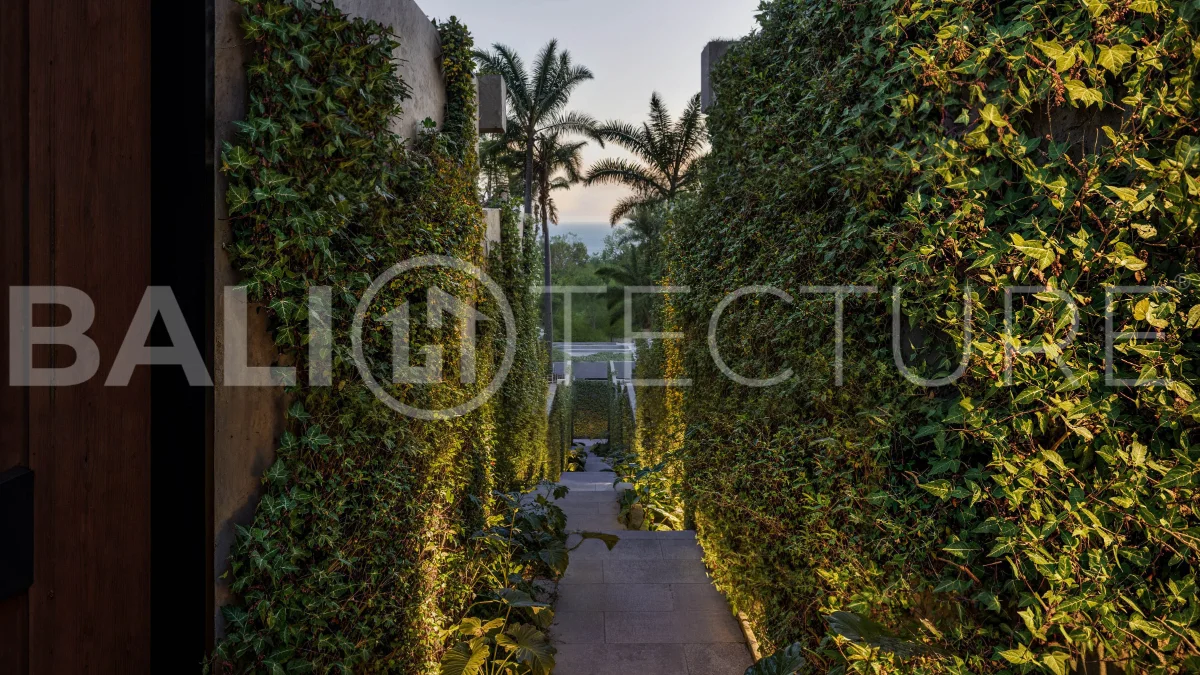Modern tropical two bedroom villa near Savaya Uluwatu, surrounded by lush jungle greenery and featuring a private pool, landscaped outdoor spaces, contemporary architecture, and a tranquil tropical setting.