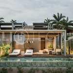 Modern tropical two bedroom villa near Savaya Uluwatu, surrounded by lush jungle greenery and featuring a private pool, landscaped outdoor spaces, contemporary architecture, and a tranquil tropical setting.