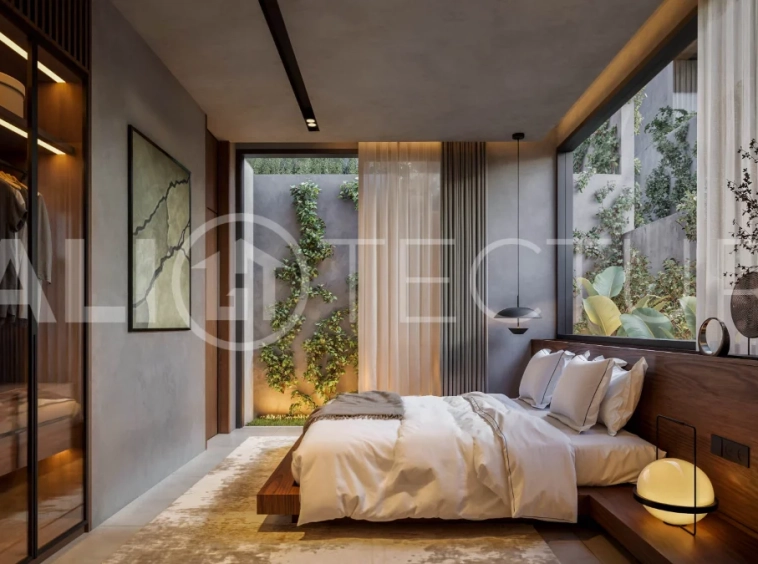 Modern tropical two bedroom villa near Savaya Uluwatu, surrounded by lush jungle greenery and featuring a private pool, landscaped outdoor spaces, contemporary architecture, and a tranquil tropical setting.