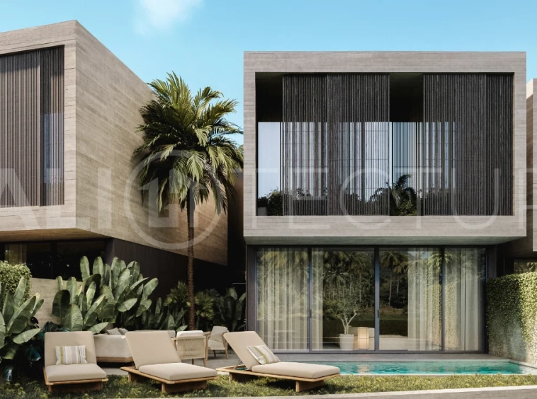 Modern three bedroom villa near Pererenan Beach in Bali, featuring a private pool, tropical landscaping, natural stone and teak wood finishes, panoramic glazing, spacious interiors with a double height ceiling, and a private courtyard.