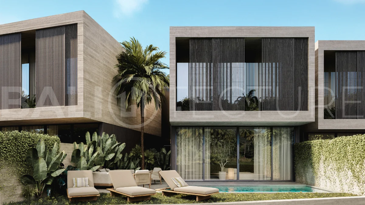 Modern three bedroom villa near Pererenan Beach in Bali, featuring a private pool, tropical landscaping, natural stone and teak wood finishes, panoramic glazing, spacious interiors with a double height ceiling, and a private courtyard.