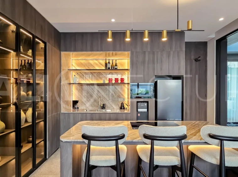 Modern two-storey luxury villa in Ubud featuring a private swimming pool, lush tropical landscaping, floor-to-ceiling glass doors, and a stylish contemporary exterior.