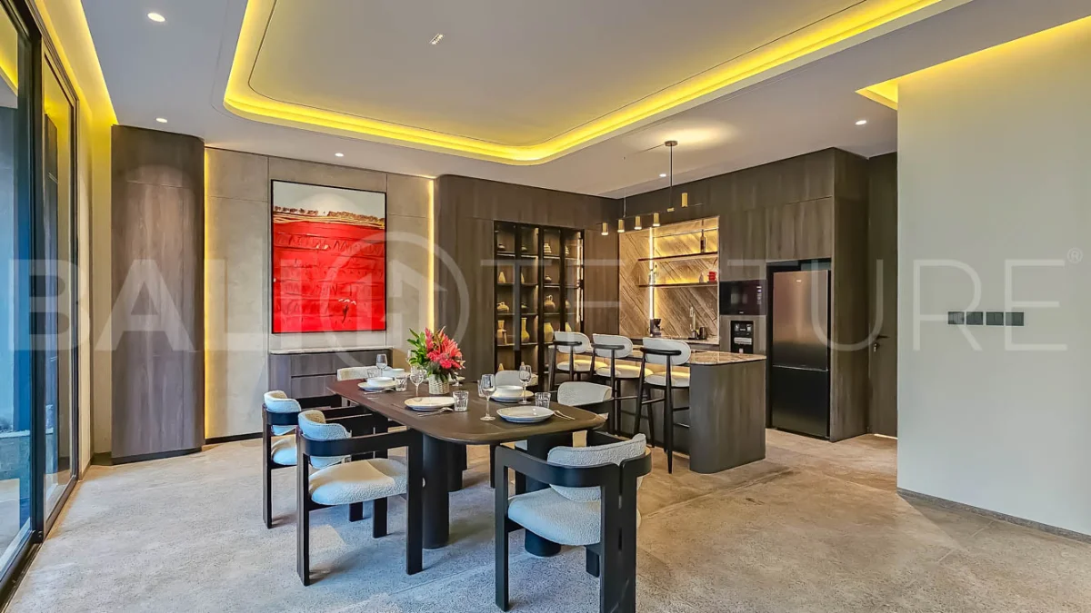 Modern two-storey luxury villa in Ubud featuring a private swimming pool, lush tropical landscaping, floor-to-ceiling glass doors, and a stylish contemporary exterior.