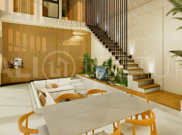 Modern tropical 4-bedroom villa for sale in Cepaka, Kaba Kaba, Bali, featuring natural stone and wood finishes, lush tropical surroundings, landscaped terraces, and a private swimming pool.