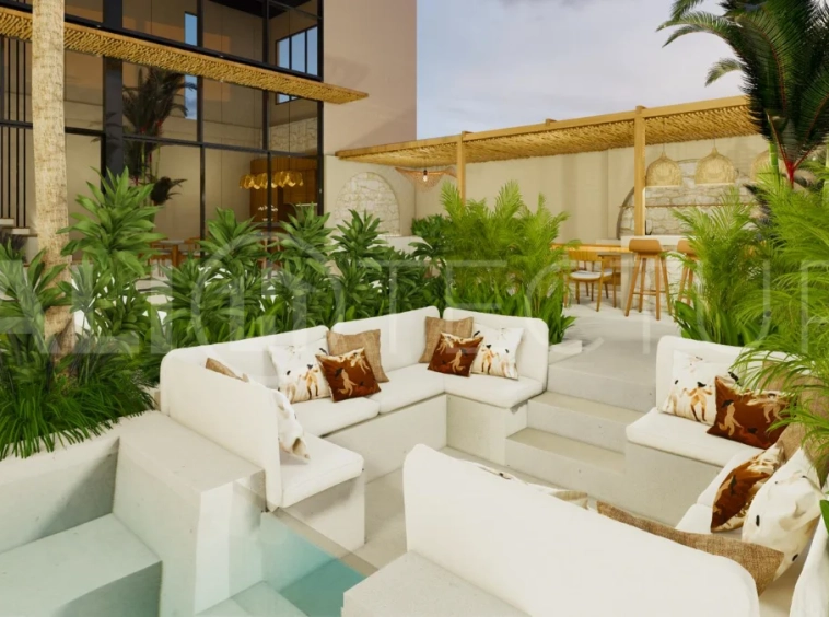 Modern tropical 4-bedroom villa for sale in Cepaka, Kaba Kaba, Bali, featuring natural stone and wood finishes, lush tropical surroundings, landscaped terraces, and a private swimming pool.