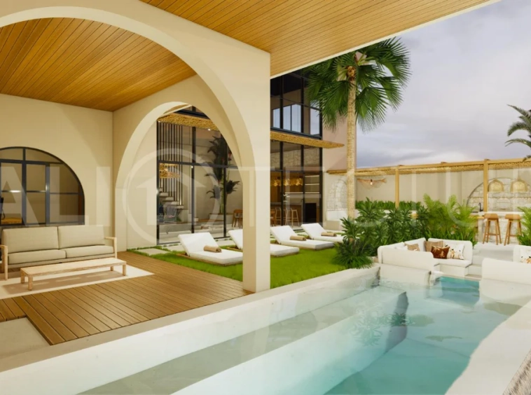 Modern tropical 4-bedroom villa for sale in Cepaka, Kaba Kaba, Bali, featuring natural stone and wood finishes, lush tropical surroundings, landscaped terraces, and a private swimming pool.