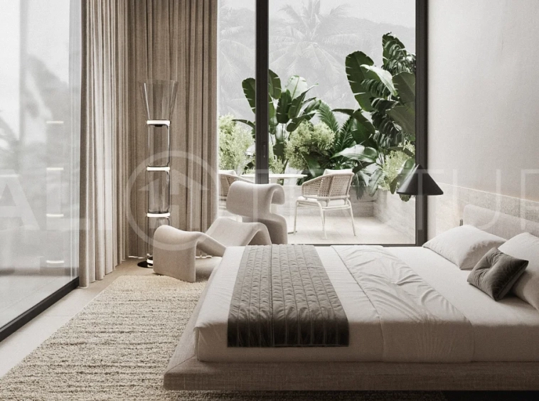 Spacious modern four bedroom villa near Pererenan Beach in Bali, featuring a private swimming pool, tropical landscaping, natural travertine and teak finishes, expansive glazing, elegant interiors, and a landscaped private courtyard.