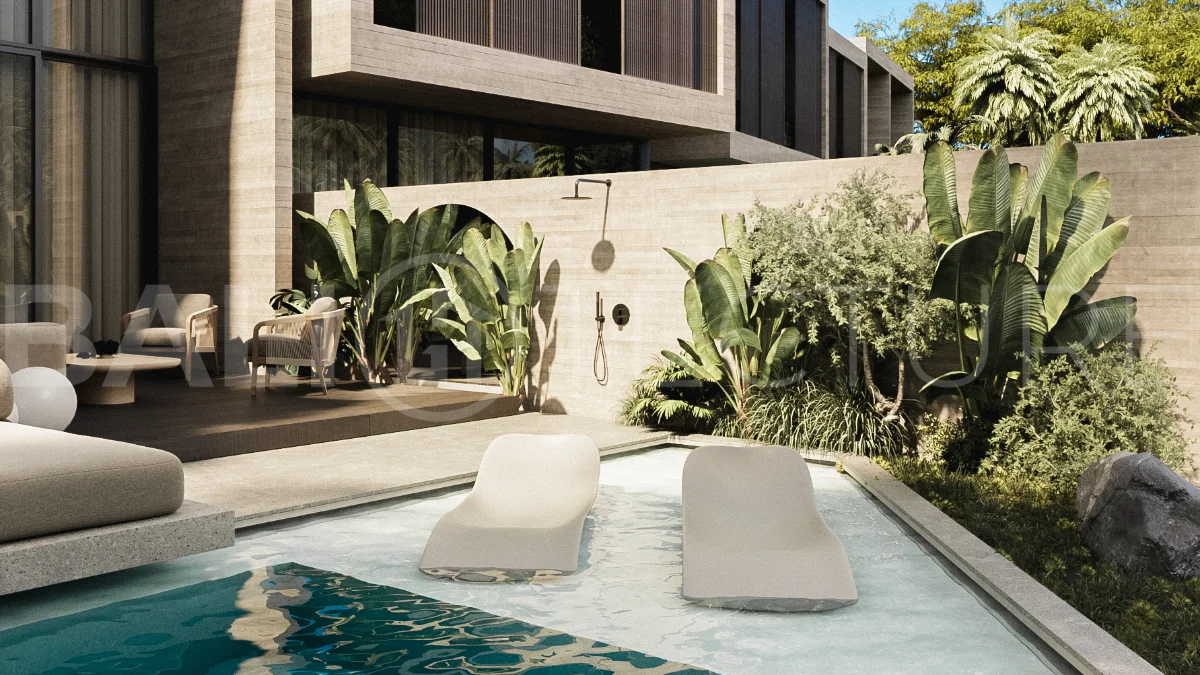 Spacious modern four bedroom villa near Pererenan Beach in Bali, featuring a private swimming pool, tropical landscaping, natural travertine and teak finishes, expansive glazing, elegant interiors, and a landscaped private courtyard.