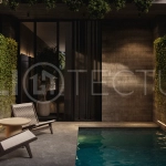 Modern two bedroom villa near Pererenan Beach in Bali, featuring a private pool, tropical landscaping, natural stone and teak wood finishes, panoramic windows, stylish interiors, and a private courtyard.