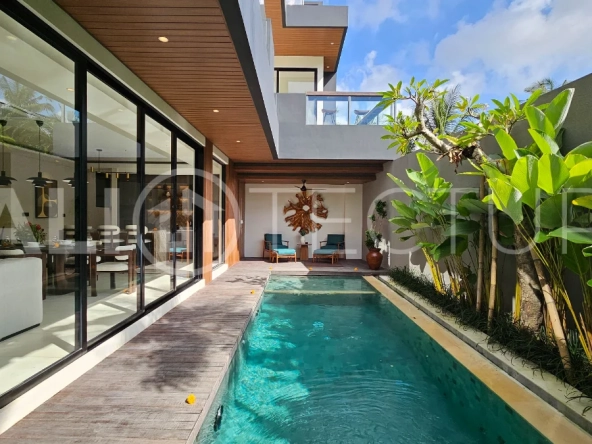 Modern two-storey villa on 200 m² freehold land featuring 3 bedrooms, 3 bathrooms, a powder room, private 2.5 m x 9 m swimming pool, warehouse, and parking for two cars.