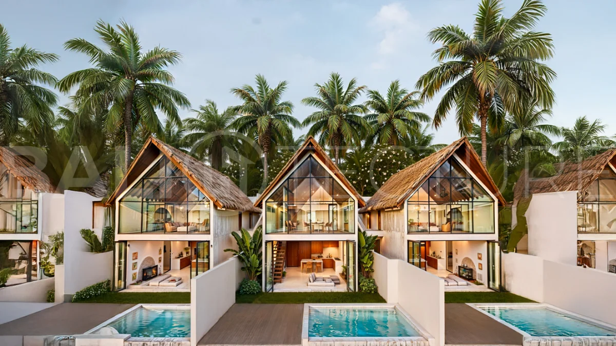 Modern tropical 3-bedroom villa development for sale in Cepaka, Kaba Kaba, Bali, featuring lush surroundings, natural materials, private and shared infinity pools, and contemporary tropical architecture.