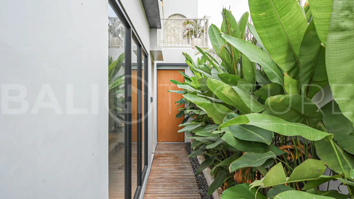 Modern villa with private swimming pool in a peaceful neighbourhood of Pecatu, Uluwatu, Bali, near New Kuta Golf, GWK Cultural Park, Uluwatu Temple, beach clubs, cafes, restaurants, gyms, and padel courts.