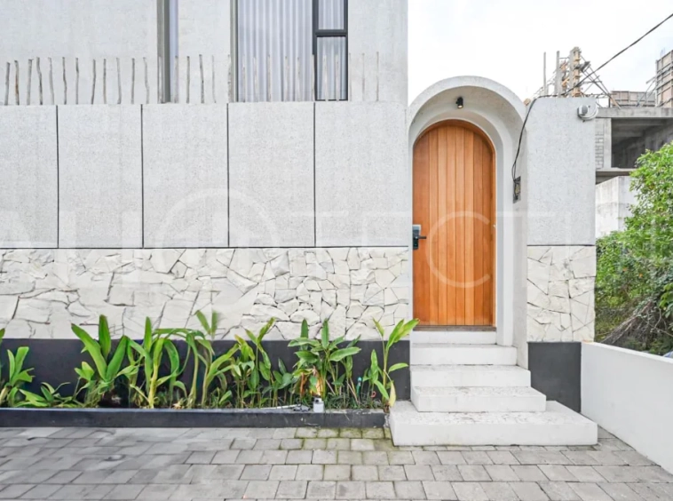 Modern villa with private swimming pool in a peaceful neighbourhood of Pecatu, Uluwatu, Bali, near New Kuta Golf, GWK Cultural Park, Uluwatu Temple, beach clubs, cafes, restaurants, gyms, and padel courts.