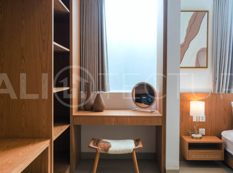 Four-bedroom furnished villa in Padonan, Canggu, featuring three bathrooms, a guest powder room, a private swimming pool, a spacious terrace, a balcony, and flexible indoor-outdoor living spaces, available on a 26-year leasehold.