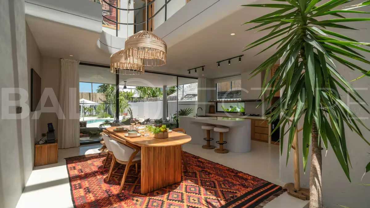Luxury villa for sale in Canggu, featuring 590.8 m² of land, approximately 200 m² of building space, a lagoon shaped private swimming pool, tropical garden, modern interiors, private sauna, and a leasehold valid until May 2047 with an extension option.