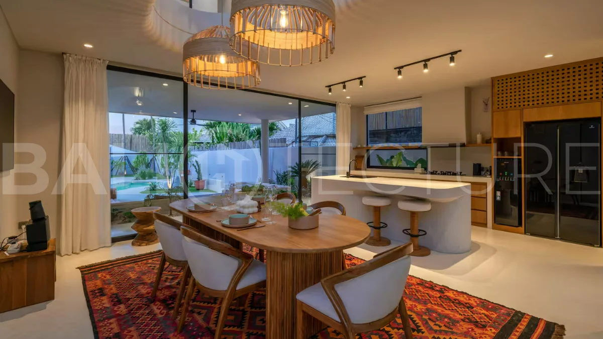 Luxury villa for sale in Canggu, featuring 590.8 m² of land, approximately 200 m² of building space, a lagoon shaped private swimming pool, tropical garden, modern interiors, private sauna, and a leasehold valid until May 2047 with an extension option.