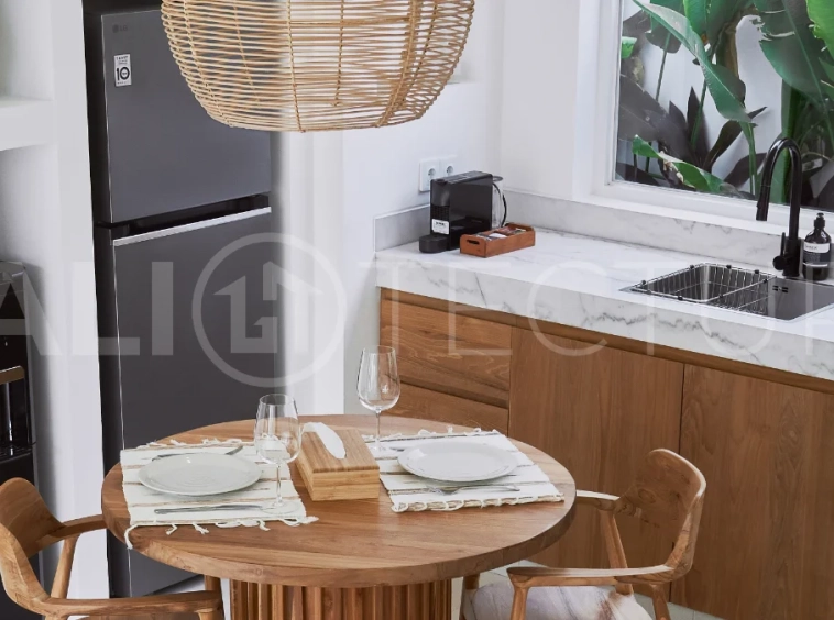 1-bedroom villa for sale in Canggu with a private pool, tropical garden, terrace, and modern living space, offered on a 25.5-year leasehold until March 2052.