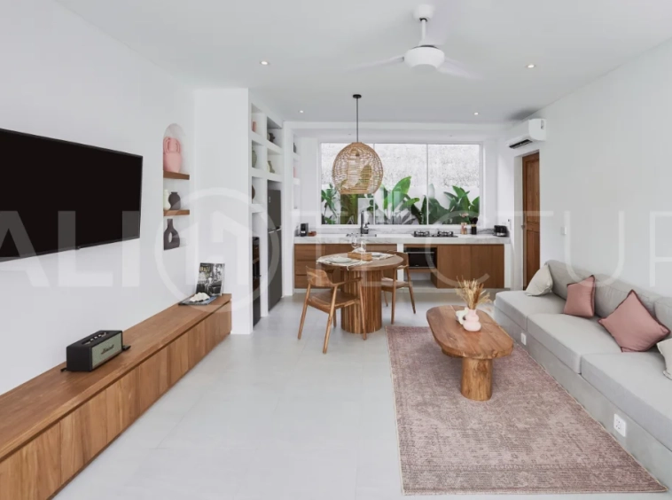 1-bedroom villa for sale in Canggu with a private pool, tropical garden, terrace, and modern living space, offered on a 25.5-year leasehold until March 2052.