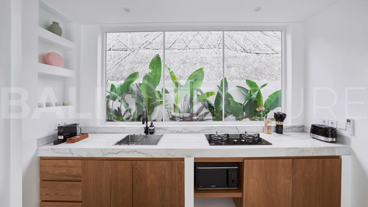 1-bedroom villa for sale in Canggu with a private pool, tropical garden, terrace, and modern living space, offered on a 25.5-year leasehold until March 2052.