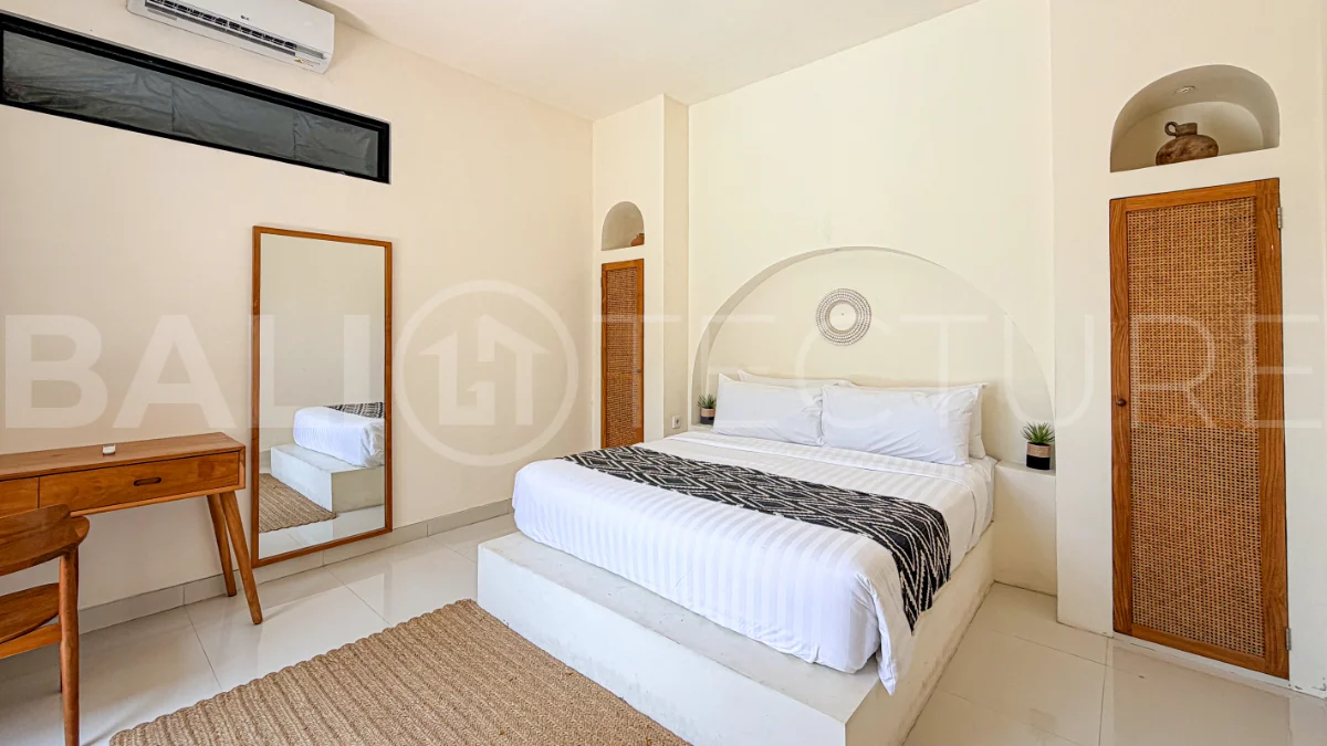 1-bedroom tropical villa for sale in Kayu Tulang, Canggu, featuring a private swimming pool, spacious bedroom, modern interiors, and a landscaped outdoor terrace.