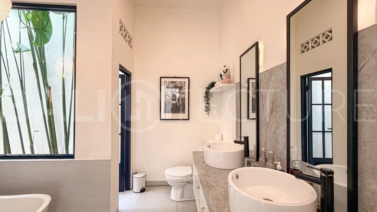 1-bedroom tropical villa for sale in Kayu Tulang, Canggu, featuring a private swimming pool, spacious bedroom, modern interiors, and a landscaped outdoor terrace.