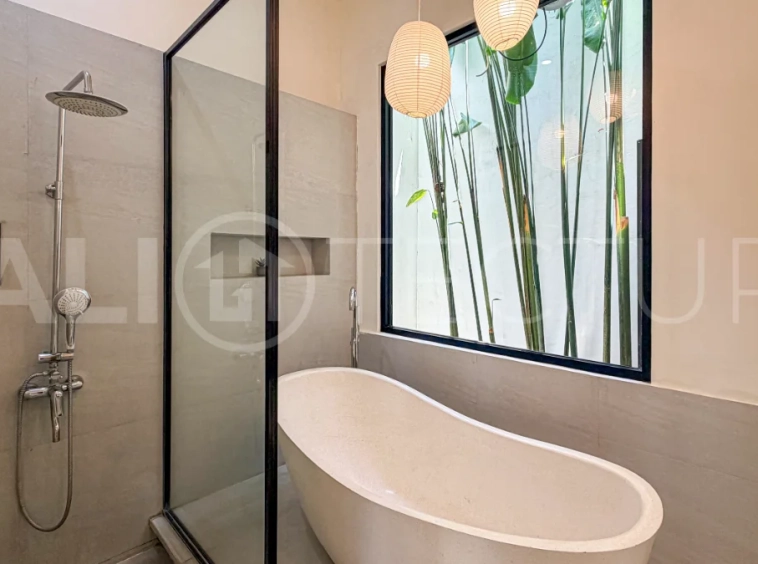 1-bedroom tropical villa for sale in Kayu Tulang, Canggu, featuring a private swimming pool, spacious bedroom, modern interiors, and a landscaped outdoor terrace.