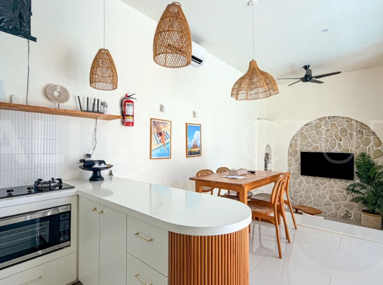 1-bedroom tropical villa for sale in Kayu Tulang, Canggu, featuring a private swimming pool, spacious bedroom, modern interiors, and a landscaped outdoor terrace.