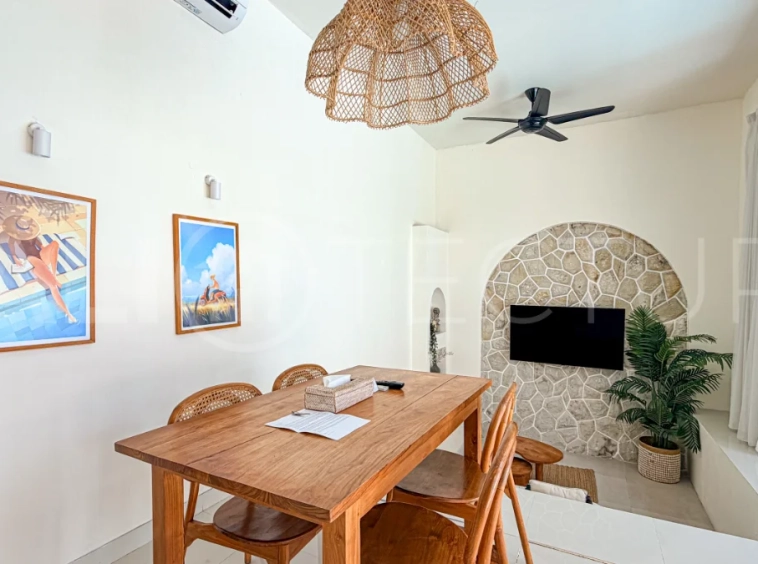 1-bedroom tropical villa for sale in Kayu Tulang, Canggu, featuring a private swimming pool, spacious bedroom, modern interiors, and a landscaped outdoor terrace.