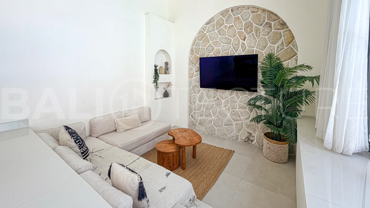 1-bedroom tropical villa for sale in Kayu Tulang, Canggu, featuring a private swimming pool, spacious bedroom, modern interiors, and a landscaped outdoor terrace.
