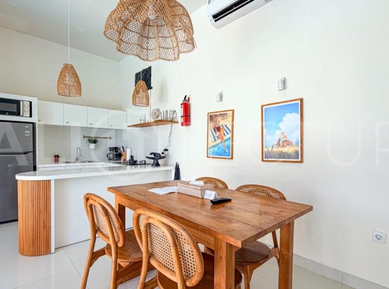 1-bedroom tropical villa for sale in Kayu Tulang, Canggu, featuring a private swimming pool, spacious bedroom, modern interiors, and a landscaped outdoor terrace.
