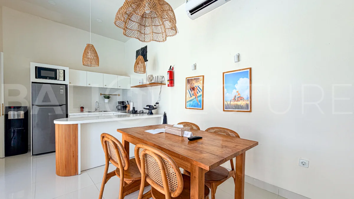 1-bedroom tropical villa for sale in Kayu Tulang, Canggu, featuring a private swimming pool, spacious bedroom, modern interiors, and a landscaped outdoor terrace.