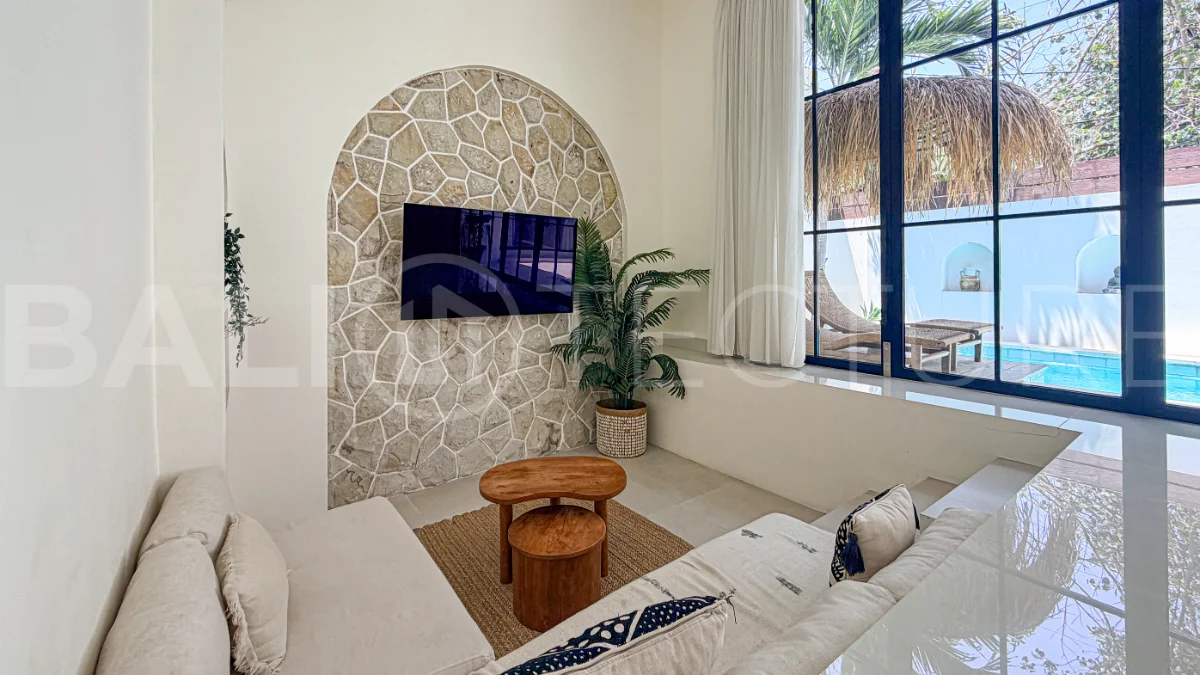1-bedroom tropical villa for sale in Kayu Tulang, Canggu, featuring a private swimming pool, spacious bedroom, modern interiors, and a landscaped outdoor terrace.