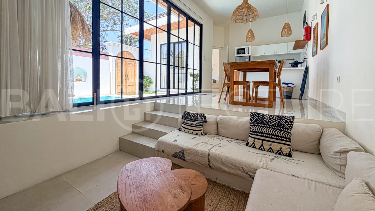 1-bedroom tropical villa for sale in Kayu Tulang, Canggu, featuring a private swimming pool, spacious bedroom, modern interiors, and a landscaped outdoor terrace.