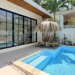 1-bedroom tropical villa for sale in Kayu Tulang, Canggu, featuring a private swimming pool, spacious bedroom, modern interiors, and a landscaped outdoor terrace.