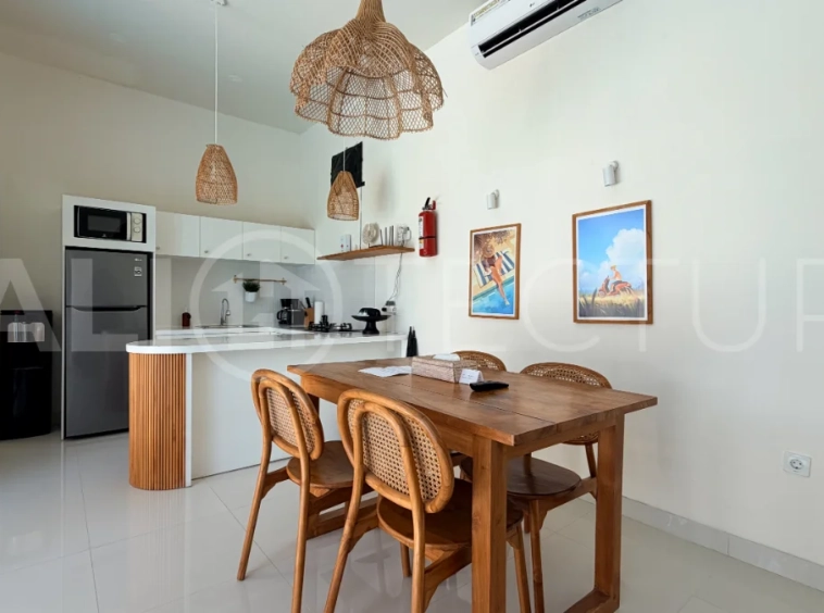 1-bedroom tropical villa for sale in Kayu Tulang, Canggu, featuring a private swimming pool, spacious bedroom, modern interiors, and a landscaped outdoor terrace.