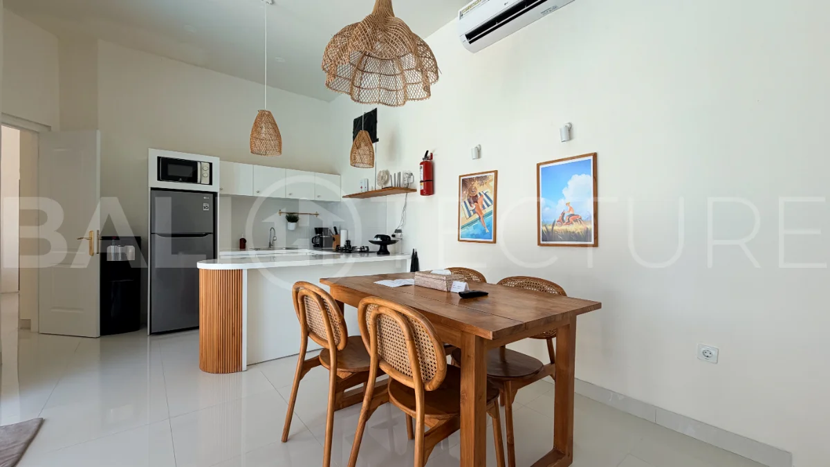 1-bedroom tropical villa for sale in Kayu Tulang, Canggu, featuring a private swimming pool, spacious bedroom, modern interiors, and a landscaped outdoor terrace.